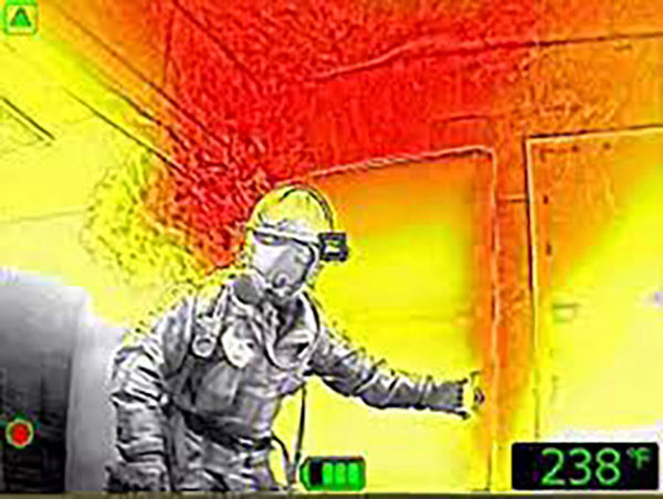 Thermal firefighter opens a hot door in a red-orange room, with 238°F shown on screen.