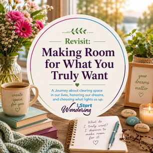 Self-help desk scene with flowers, mug, candle, notebook, stones, and sign reading Revisit: Making Room for What You Truly Want.