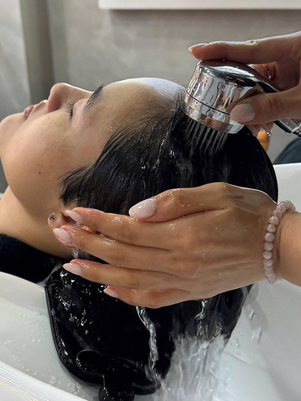 Eye-level view of a modern hair salon chair with natural light