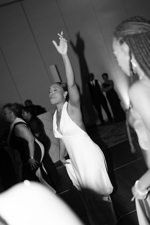 Bride dancing joyfully during her luxury Puerto Rico wedding reception, creating an unforgettable guest experience.
