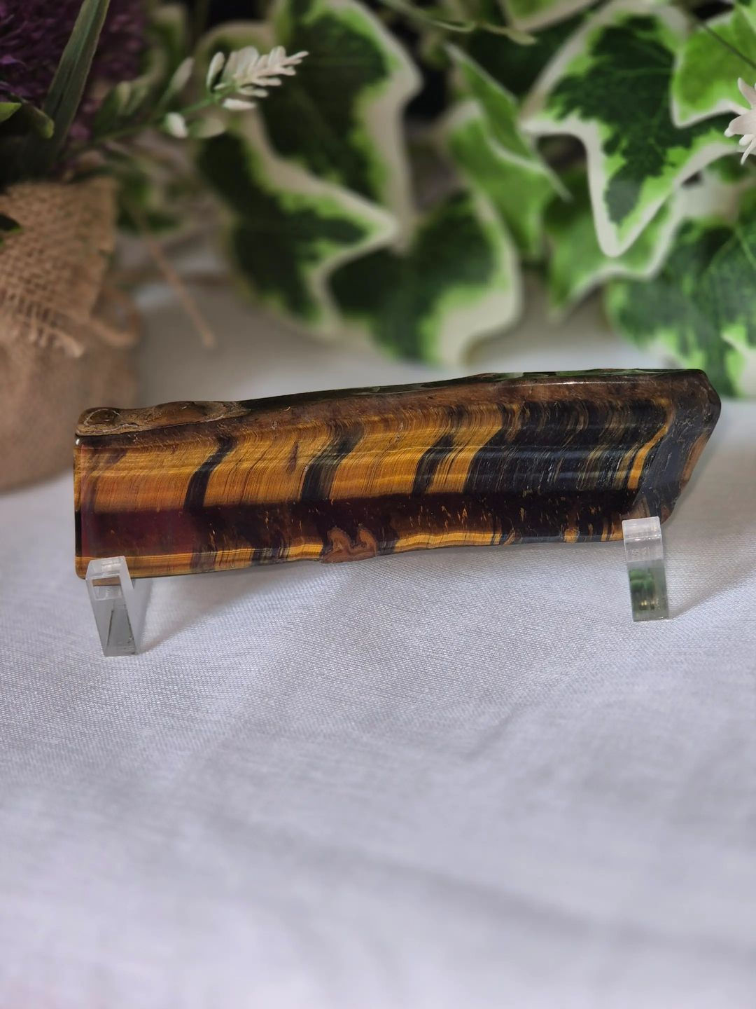 Tigers eye polished slice with stand