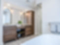 Traditional style bathroom photographed by Ake P and designed by Hanna Shiplett with wood cabinetry and tile wall