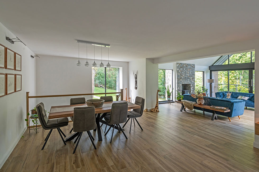 An elegant open-plan living room with balanced proportions and natural light.