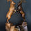 Miniature : Bouquetin en bronze avec son modèle original en noyer. Sculptures de Christian Delacoux, h 43 cm.