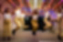 Dancers dancing graciously at a dance company in Manhattan