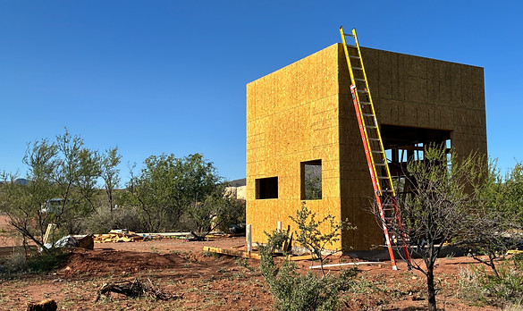 Modern desert distillery taking shape beneath the Arizona sky