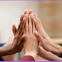 Diverse group of hands stacked together, representing unity and collaboration