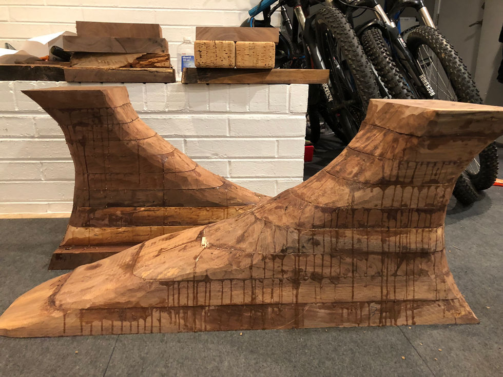 Sculpted table, 38”L X 27”H X 18”H
