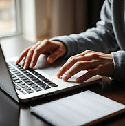hands typing on a laptop.jpg
