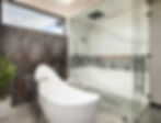 Bathroom with glass shower and free standing tub