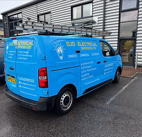Blue DJD Electrical Services van with yellow branding and ladders