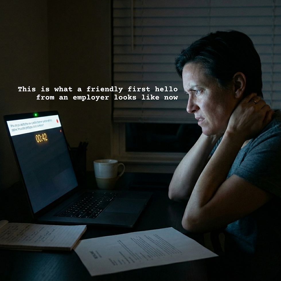Job seeker sitting alone in front of a laptop at night completing a timed one-way video interview, with text reading “This is what a friendly first hello from an employer looks like now.