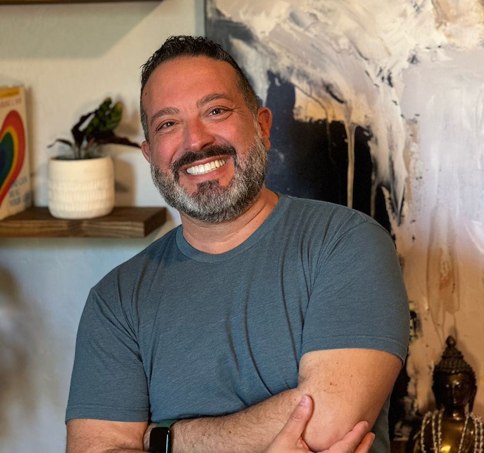 Pasquale, Spiritual Life Coach & Energy Healer, embodying peace and high vibes in a serene setting.