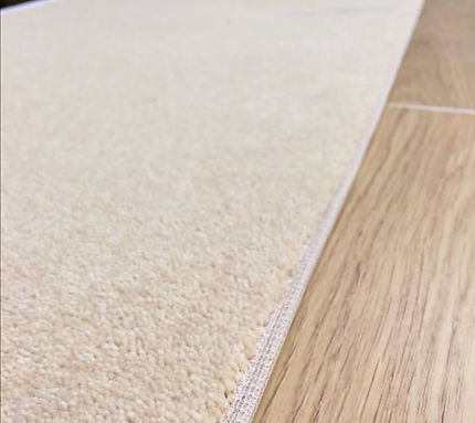 Narrow Tape Binding on a beige carpet
