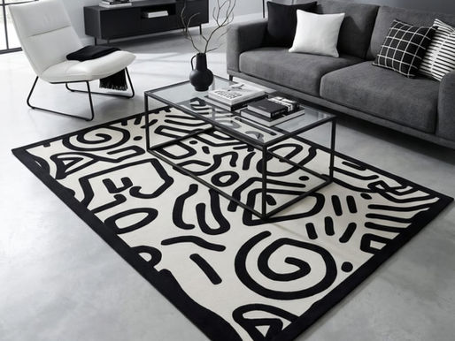 Close up view of a patterned rug with black cotton tape edging in a stylish living room
