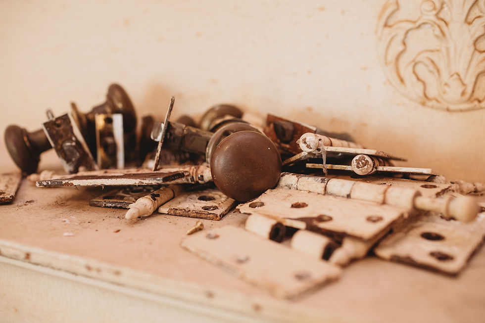 Original antique door hardware and knobs removed and preserved during restoration of an 1898 farmhouse