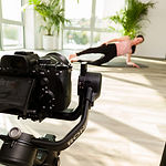 camera filming yoga