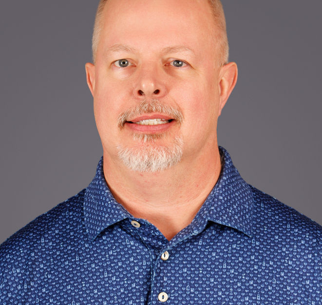 Fine art studio style professional headshot photo of a man.