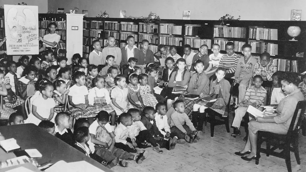 The “Colored Library” opened in 1927 in the YMI, changed its name to the Market Street Branch of City Libraries in 1951 and closed in 1966, the library system having desegregated in 1962. Here, Elizabeth Howze, a Livingston Street School teacher, conducts a story hour in 1959.