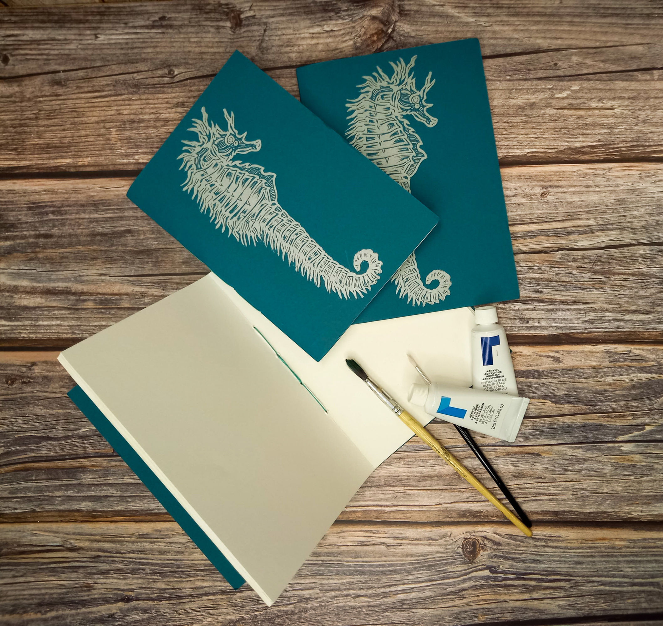Handmade A5 notebook with silver seahorse lino print cover