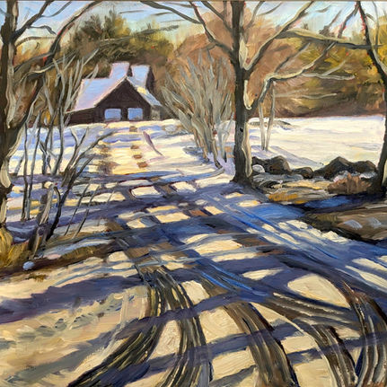 A snowy road with dramatic tree shadows leads to a distant cabin. Trees and rocks line the path. Warm, earthy tones dominate the winter scene.