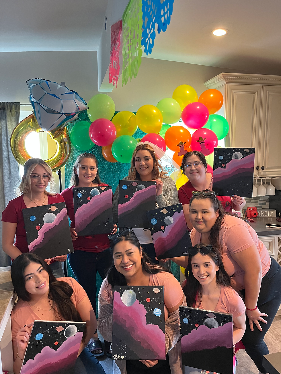 Group of women holding bachelorette paint and sip paintings from Miranda Rose Art