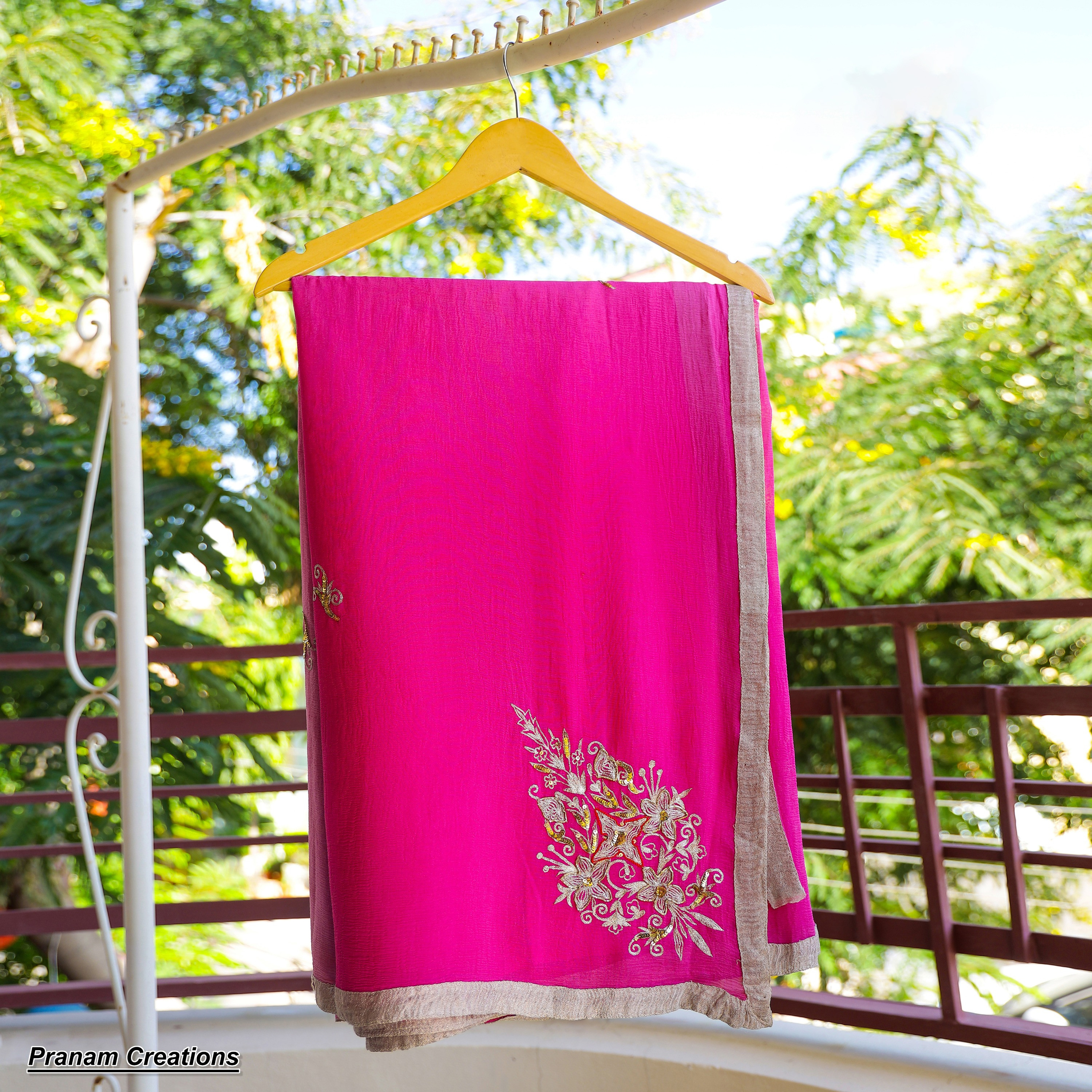 Pleasant pink pure chiffon saree with aari-tari embroidery and sequence work