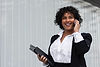 business-woman-talking-phone-side-view Large.jpeg