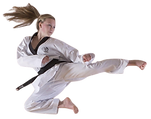 Young female student of Tan'Gun Martial Arts Academy in white taekwondo uniform performing a flying side kick.