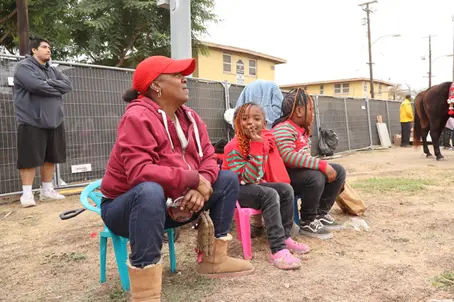 Nickerson Gardens residents praise TDE for bringing Christmas cheer and resources year-round