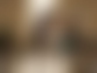 Therapist guiding knee rehab in clinic