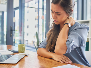 Desk Dilemma: How Sedentary Work Takes a Toll on Your Body and How Massage Therapy Can Provide Relief