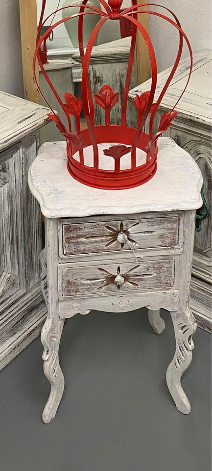 Small distressed white table