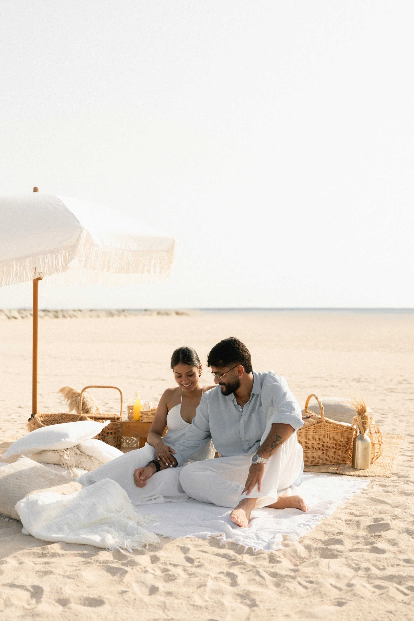 A boutique style breakfast picnic experience in Dubai with soft textures, bespoke, and gourmet platters for couples or intimate gatherings