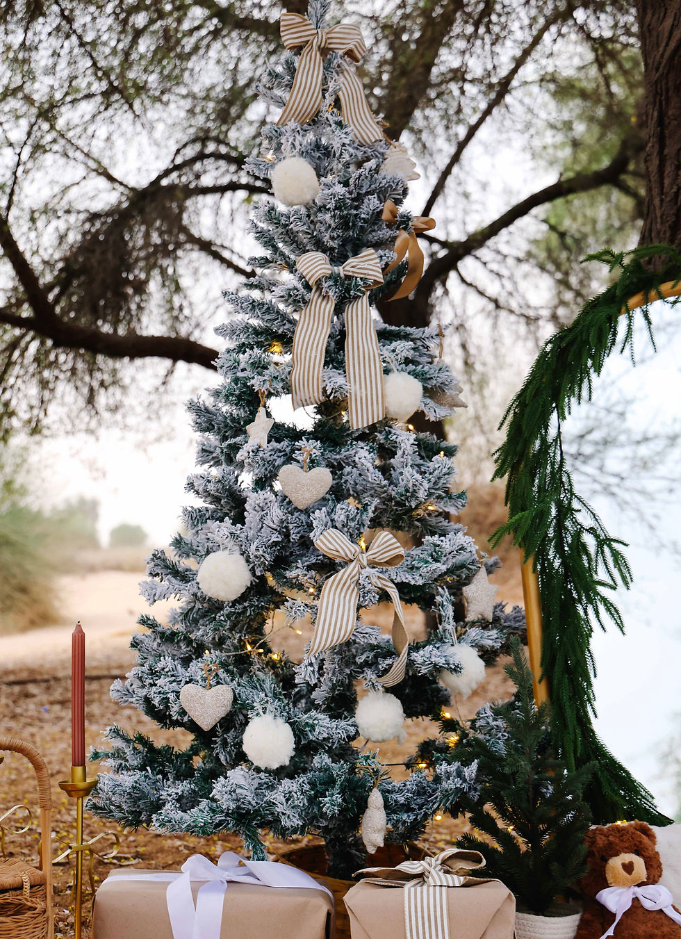 Luxury Christmas picnic experience in Dubai featuring soft lighting, natural textures, and elegant styling