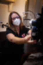 eye doctor at serve the people examining