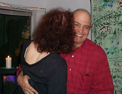 Barbara Romain embracing with her husbnad Chris Peditto in a red plaid shirt on New Year dance Chris