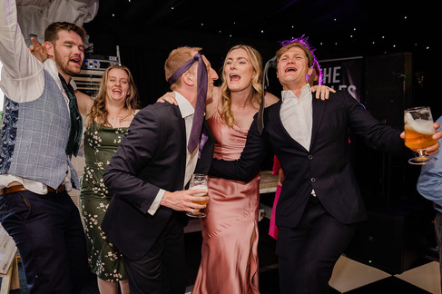 fun lively dancing photos on the dancefloor at ashton lodge country house wedding photography