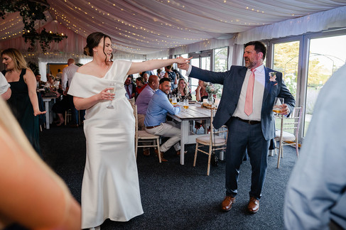 fun lively dancing photos on the dancefloor at ashton lodge country house wedding photography