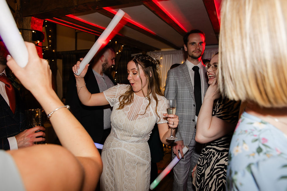 Guests enjoying dancing and celebration during relaxed wedding reception photographyew-35