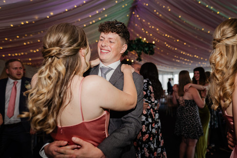 fun lively dancing photos on the dancefloor at ashton lodge country house wedding photography