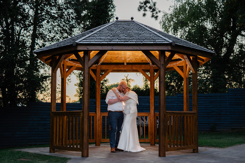 bride and groom happy and relaxed sunset photos at ashton lodge country house wedding photography