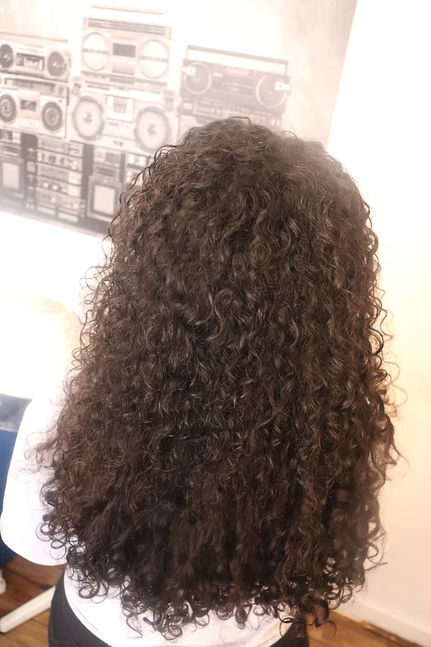 curly weave manchester