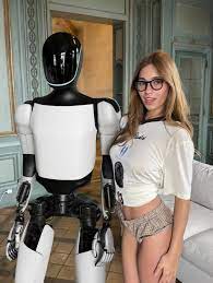 A women and a sex robot are in the picture