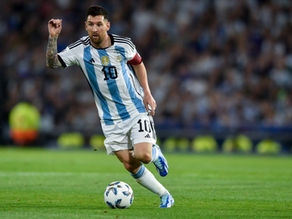 Pictured is Lionel Messi holding the ball and playing in the 2026 FIFA World Cup