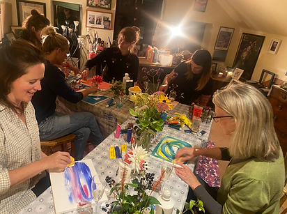 Friends enjoying themselves at a Painting Party