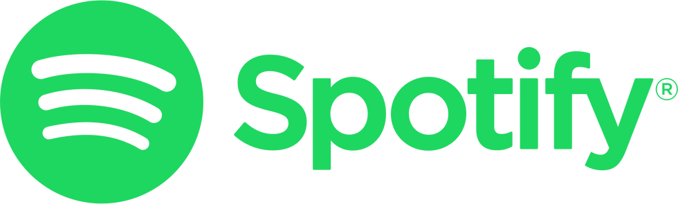 Green Spotify logo featuring the three curved sound waves inside a circle, followed by the word 'Spotify' in bold lowercase letters.