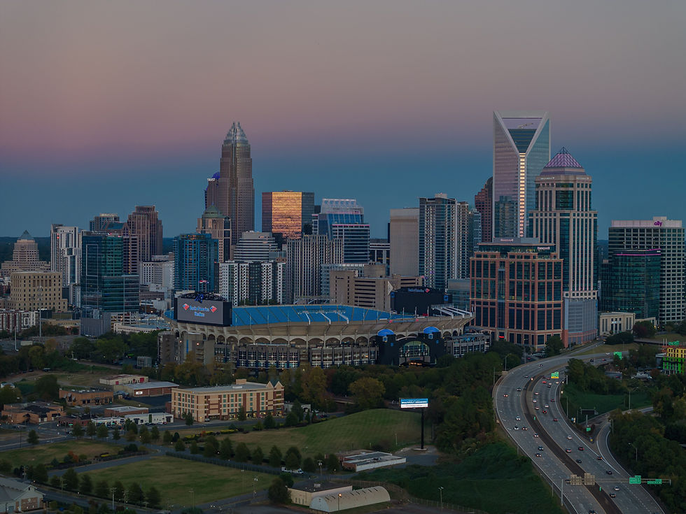 Aerial view of the Charlotte skyline at dusk with Bank of America Stadium in the foreground, promoting the MLS All-Star Match.
Don’t miss the action—secure your MLS All-Star Match tickets on Ticketmaster today.
