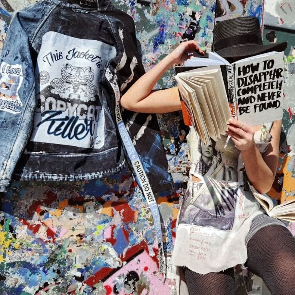 Rina Wolf reading a book titled “How to Disappear Completely and Never Be Found,” next to a customized denim jacket with “Copycat Killer” on the back.