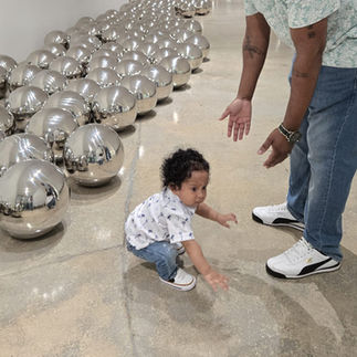 This editorial follows Dennis—self-described “immersive art extremist”—and his family as they toured Superblue Miami and the Rubell Museum. Through the reactions of their one-year-old son, the piece contrasts immersive, sensory-driven installations with provocative contemporary art, revealing the tension between instinct and interpretation. The experience also reflects on the visionary creatives behind Superblue, who connect to Beyoncé’s Renaissance World Tour and the Sphere in Las Vegas. (Full galleries included)